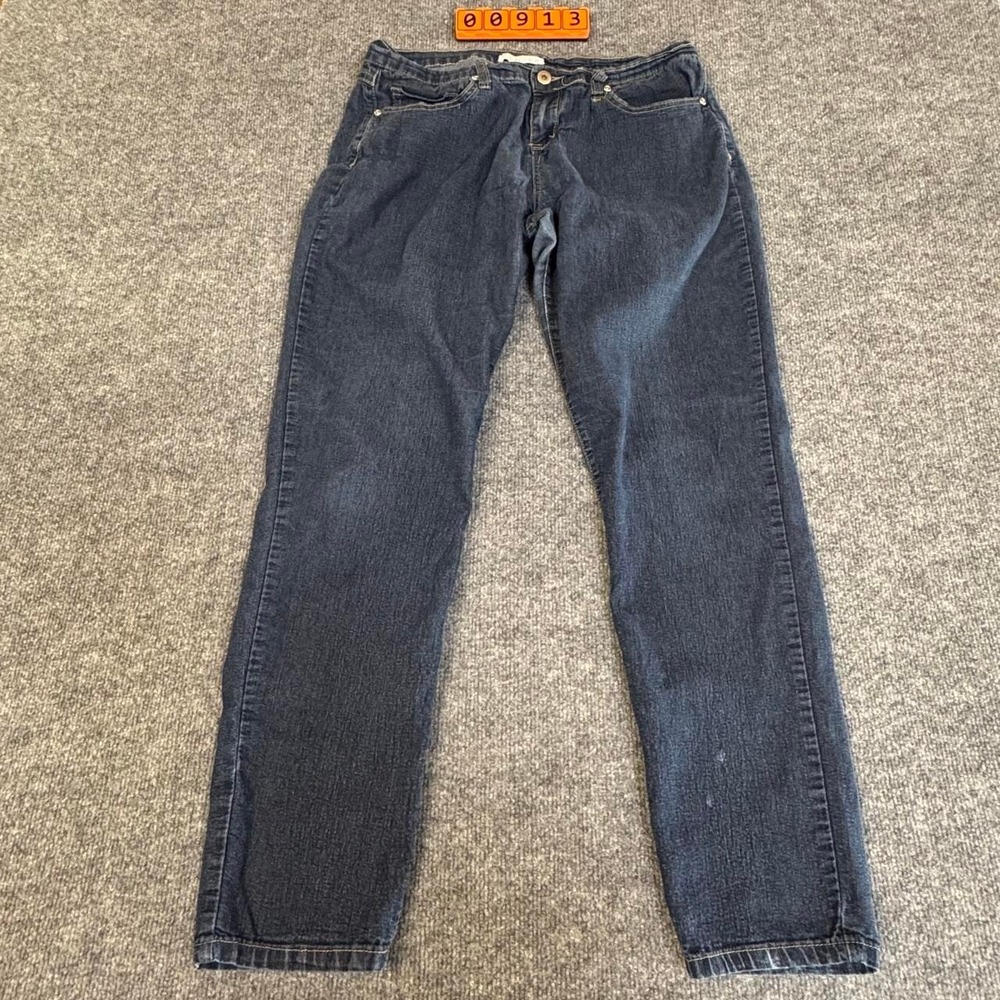 Forever 21 dark wash straight leg jeans. 32" waist. Minor distress.